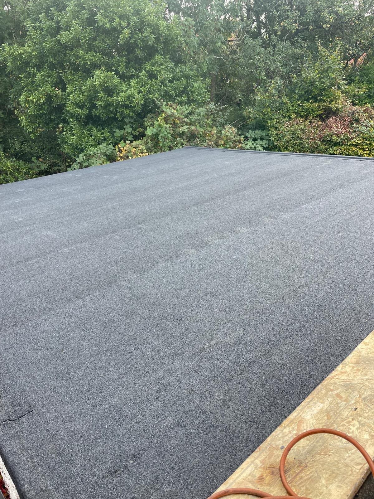 Newly installed mineral felt flat roof on a garage, flat roofing in Somerset