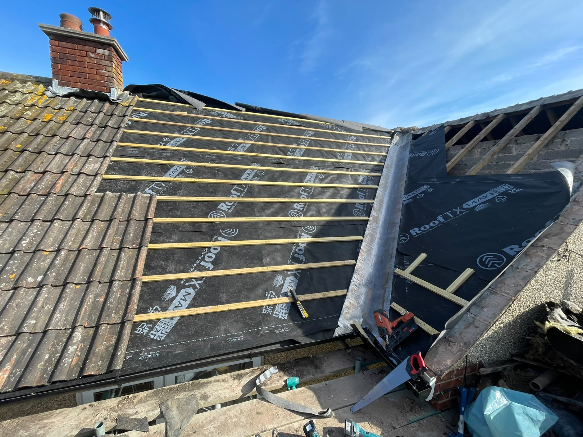 Roof valley with new lead and membrane, battens fixed ready for tiling, re-roofing Somerset